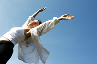 Who benefits from the services of a holistic health coach?
